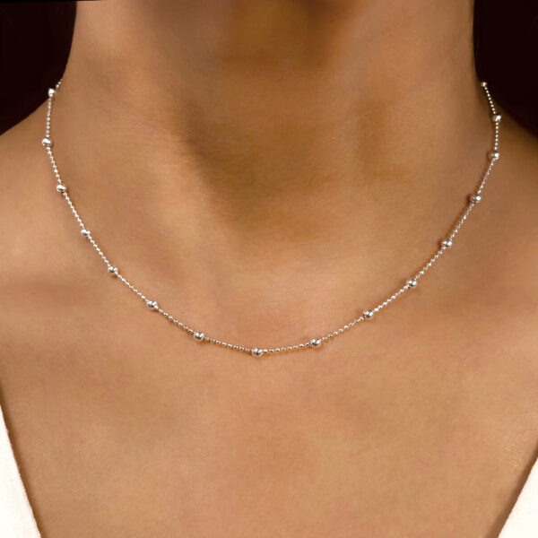 COLLAR DOBLE BOLITAS-3.4 GR